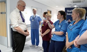 John Swinney defends NHS efforts as Anas Sarwar points to failed plans